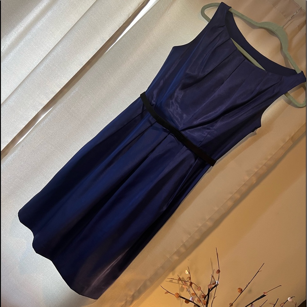 Navy blue size 4. Excellent condition, used once,evening dress.